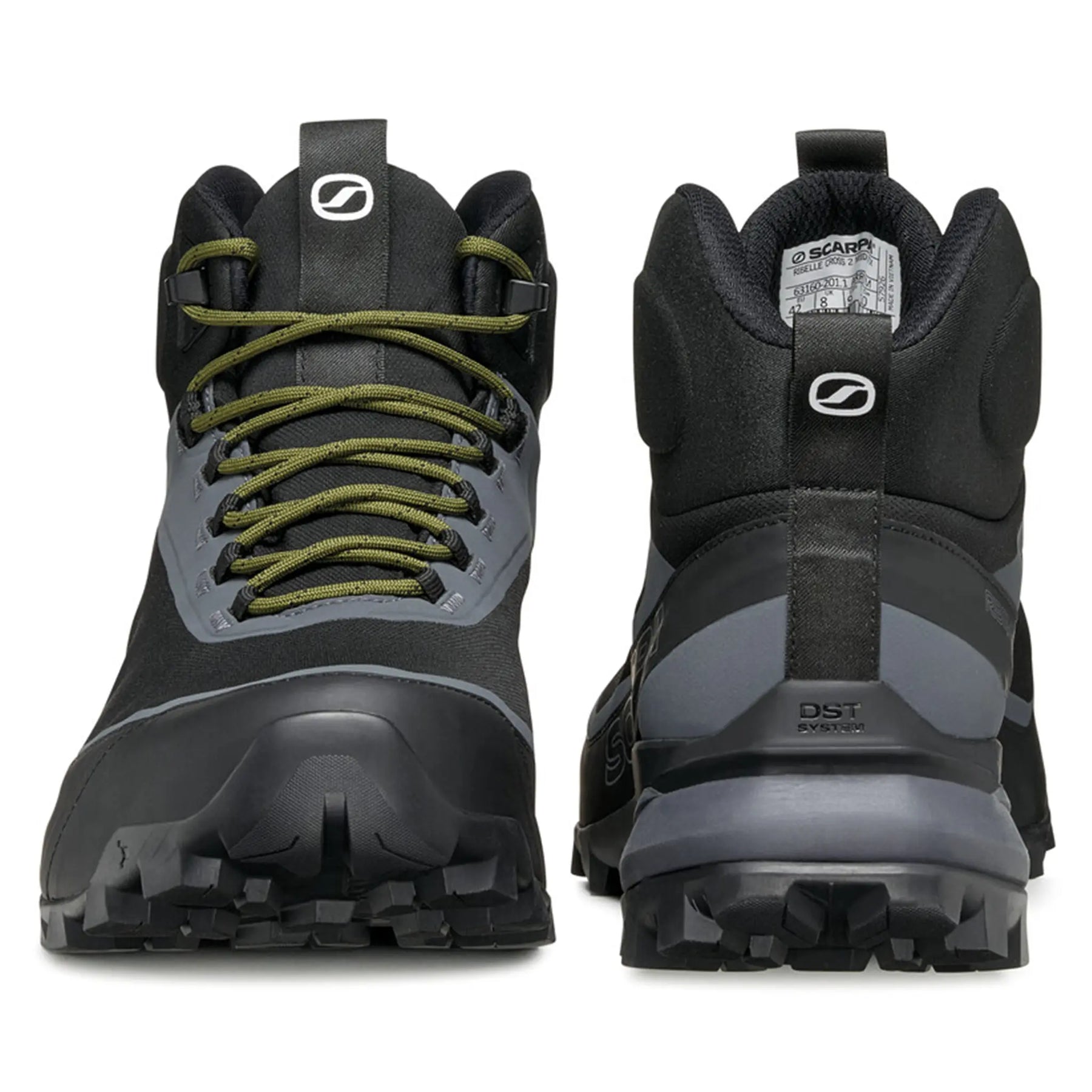 Black hiking boots with green laces on a white background