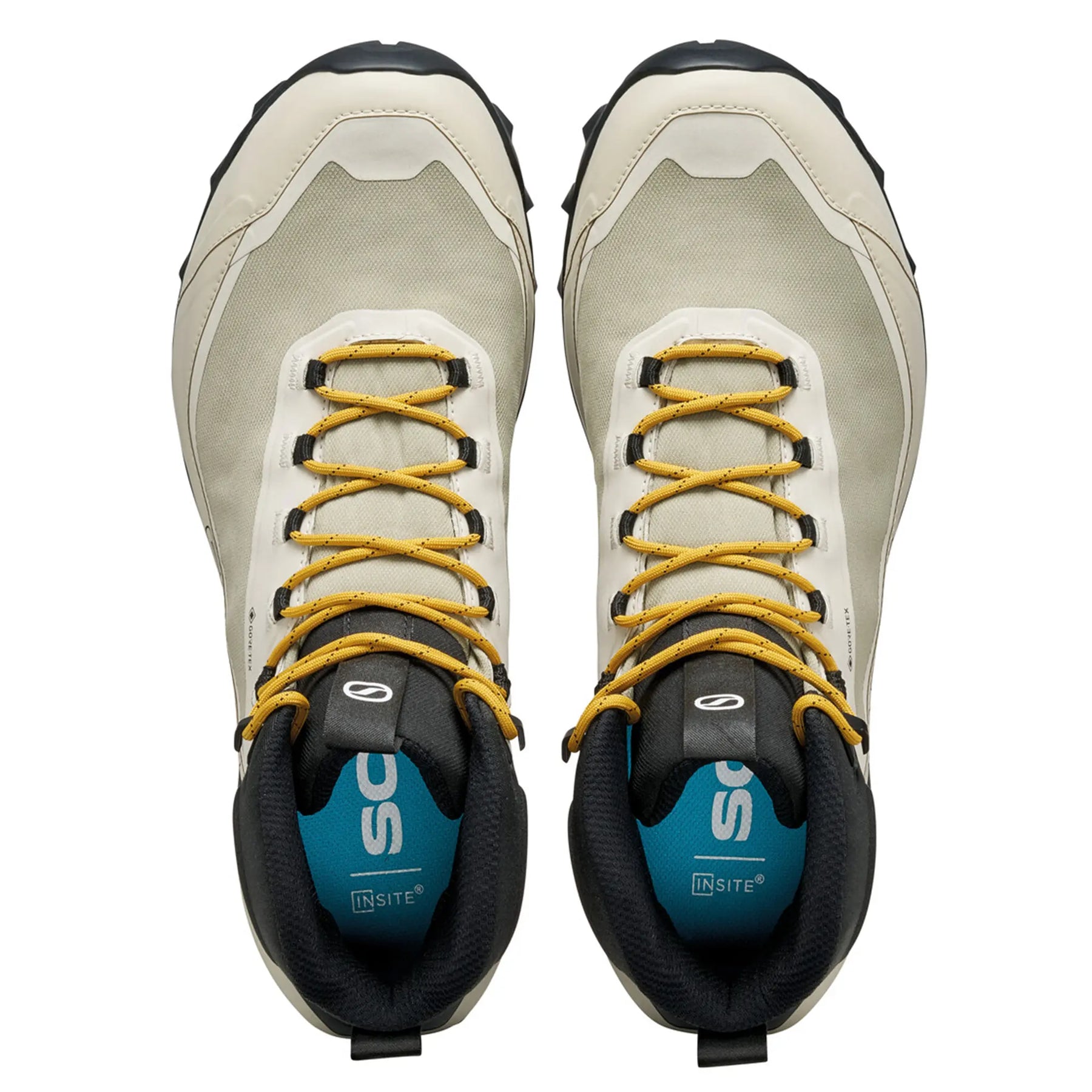 Pair of hiking shoes with yellow laces on a white background