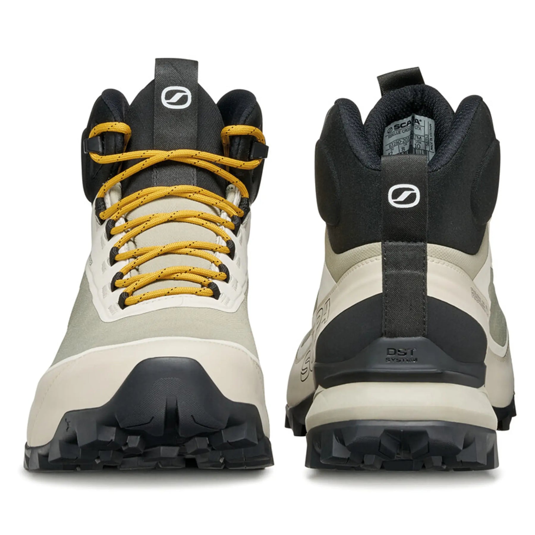 Pair of hiking boots with yellow laces on a white background
