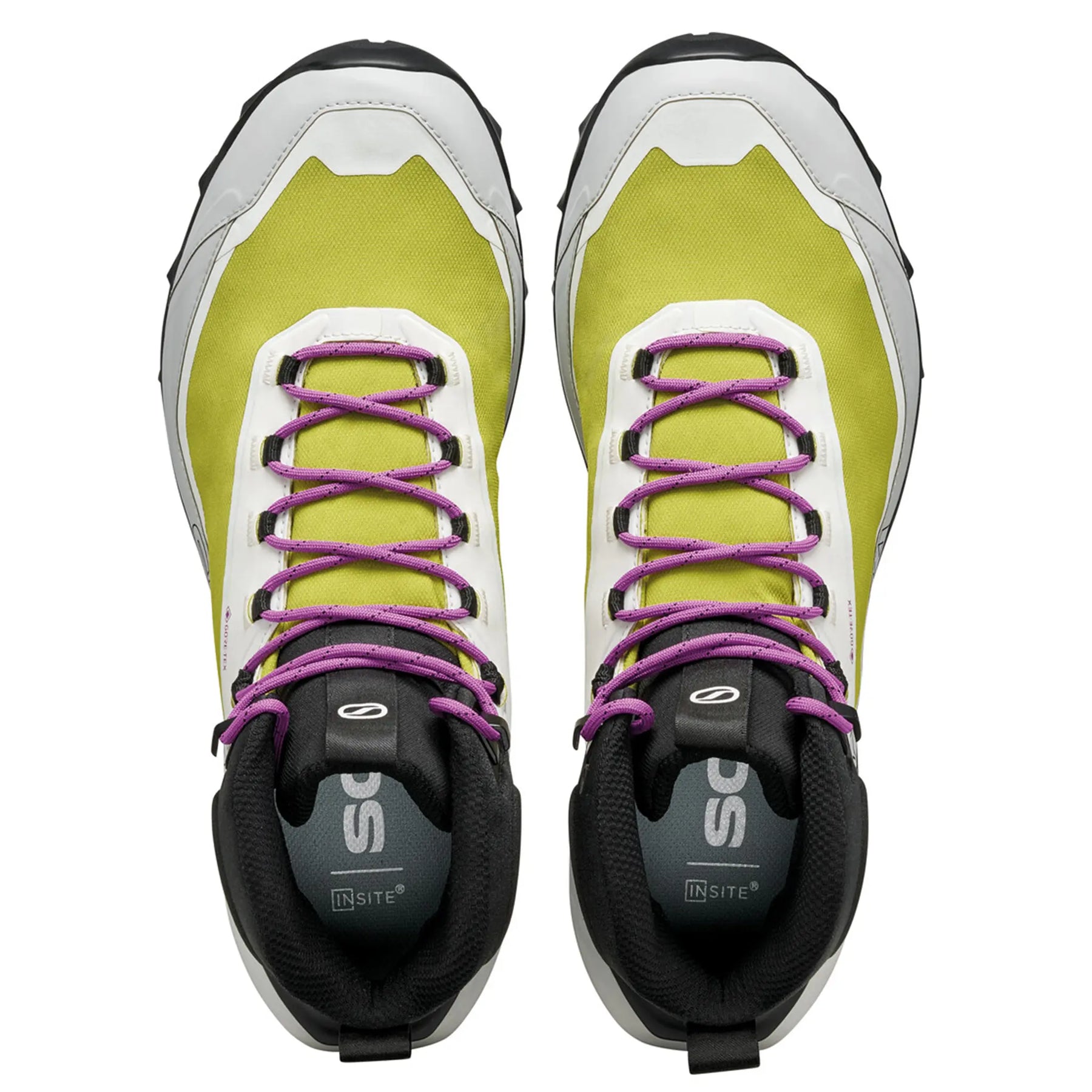 Pair of green and black athletic shoes with purple laces on a white background