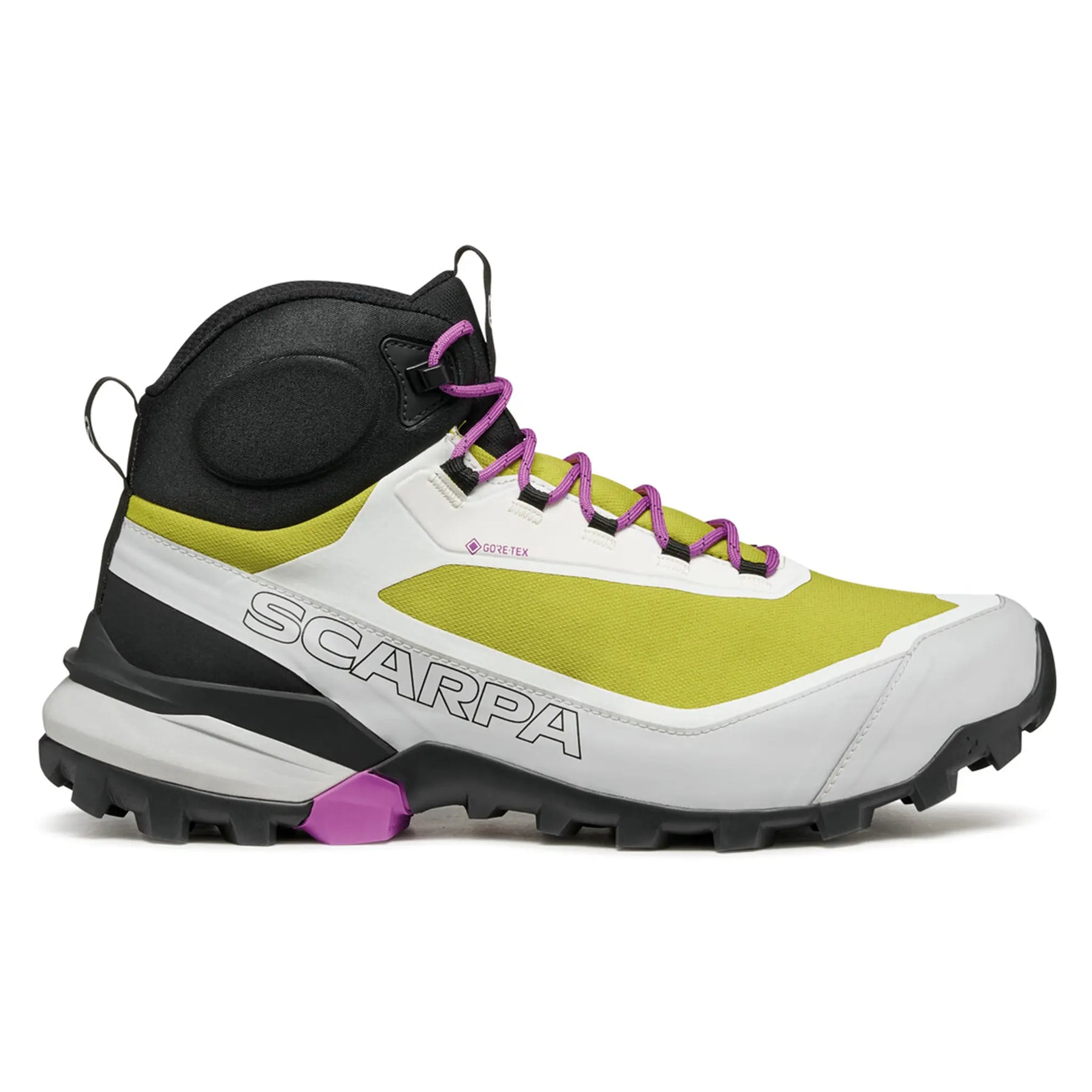 Hiking boot with white, green, and black design on a white background