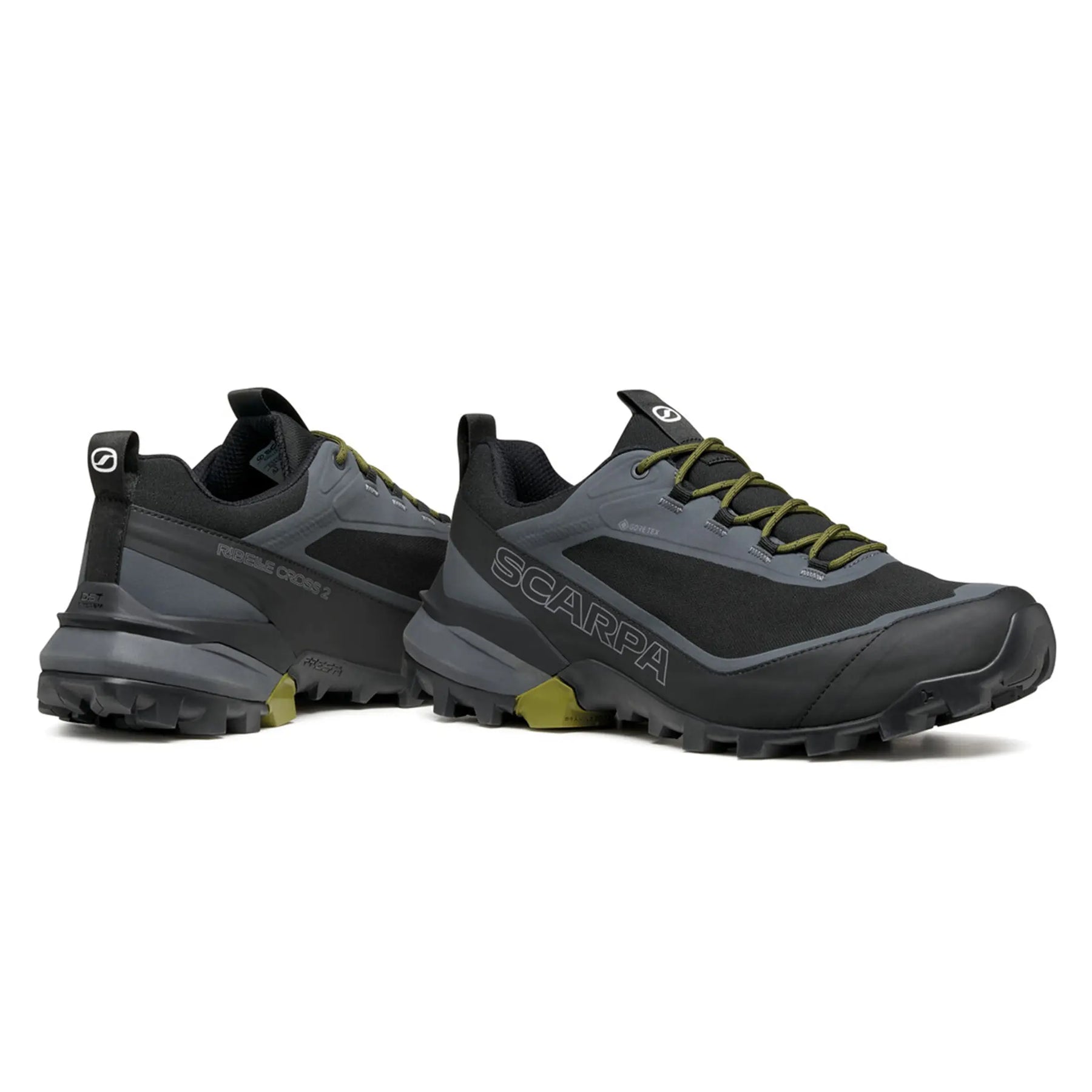 Pair of black and gray hiking shoes with green accents on a white background