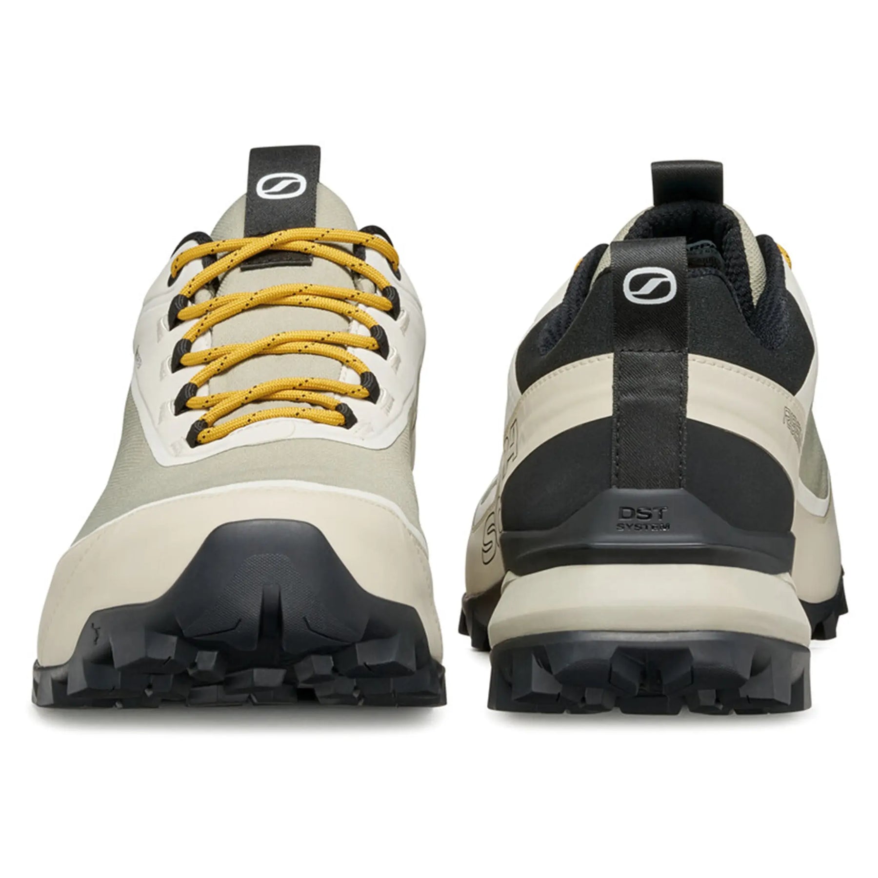 Pair of hiking shoes with yellow laces on a white background