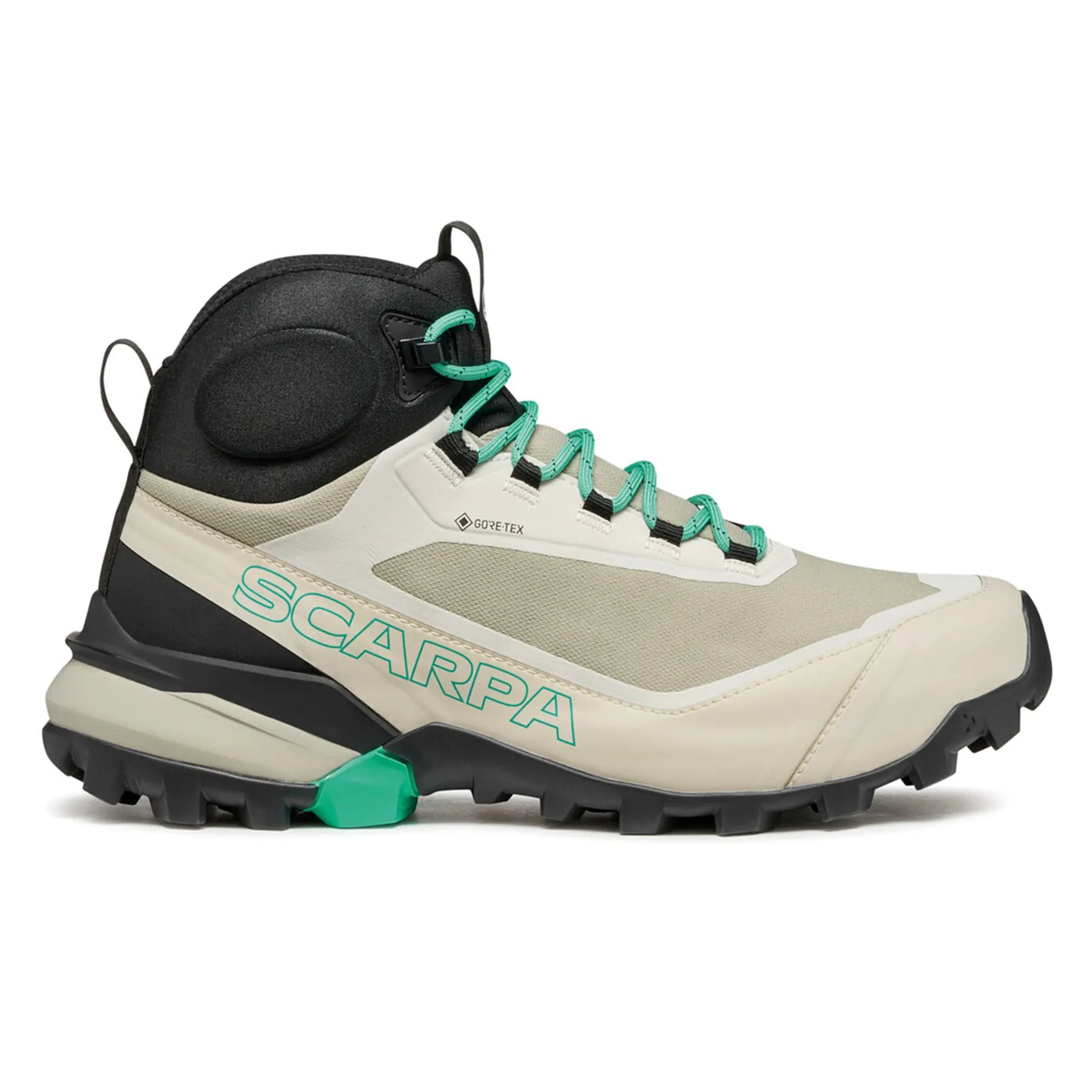 Beige hiking boot with green accents and 'Scarpa' branding on a white background