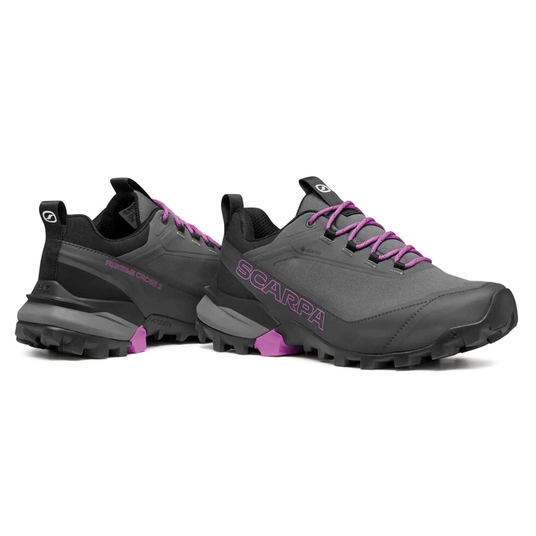 Pair of gray and black shoes with purple accents on a white background