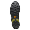 Close-up of a black hiking boot sole with tread pattern on a white background