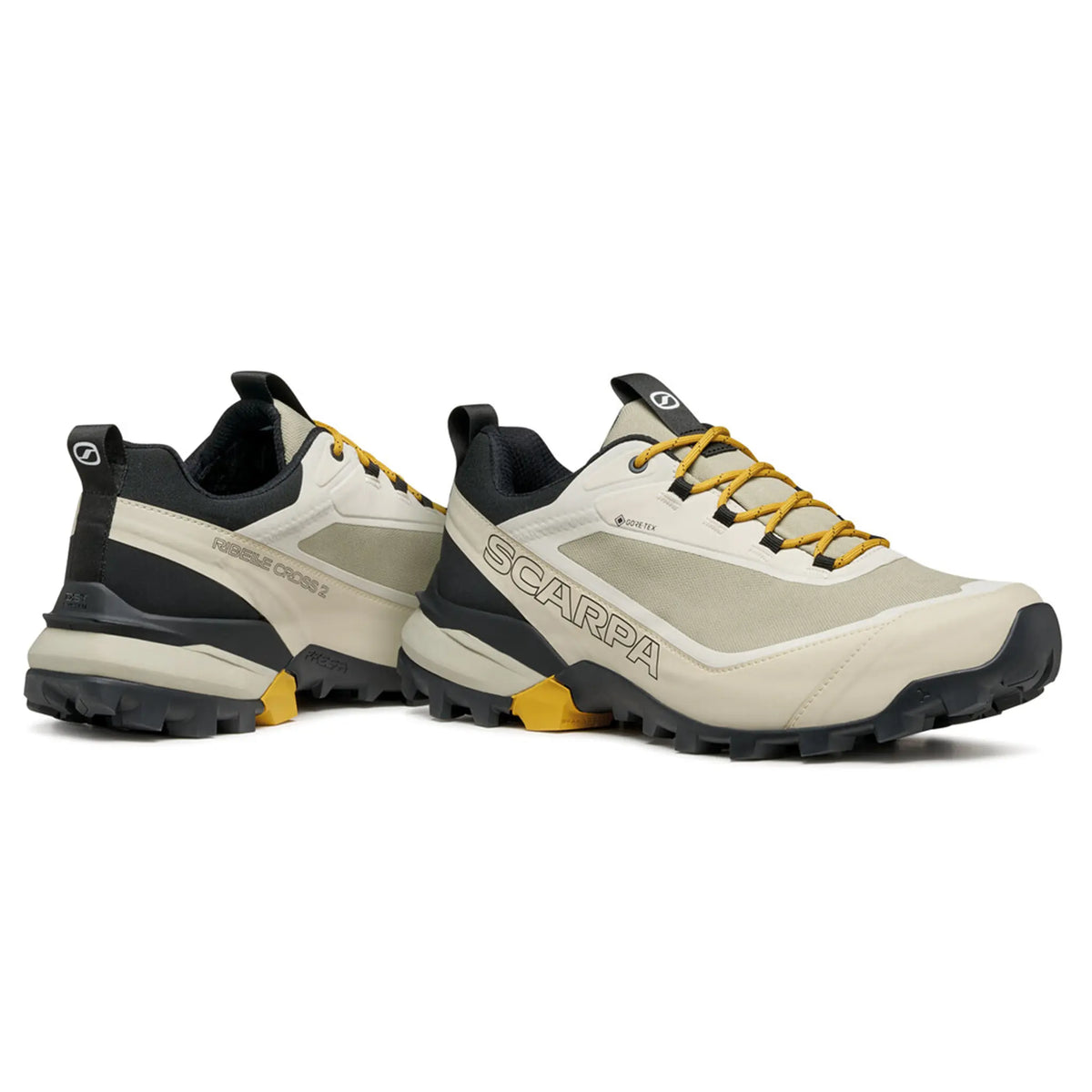 Pair of beige and black hiking shoes with yellow accents on a white background, featuring the Scarpa brand.