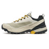 Beige and black hiking shoe with yellow accents on a white background