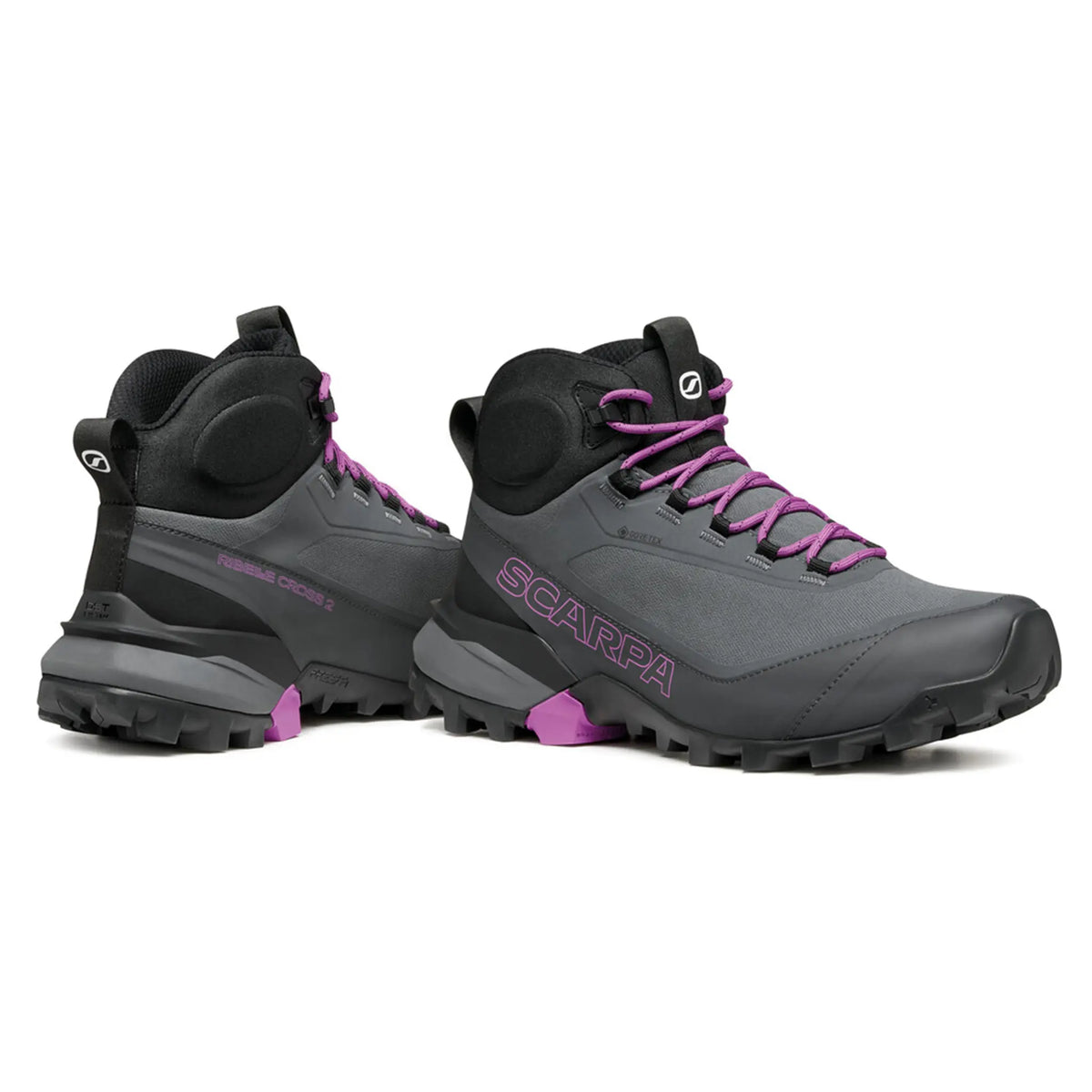 Gray hiking boots with purple accents and Scarpa branding on a white background