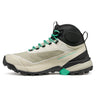 Hiking boot with beige, black, and green color scheme on a white background