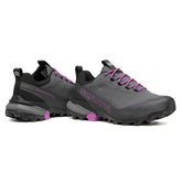 Pair of gray and black shoes with purple accents on a white background