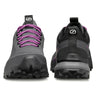 Pair of black and gray shoes with purple laces on a white background